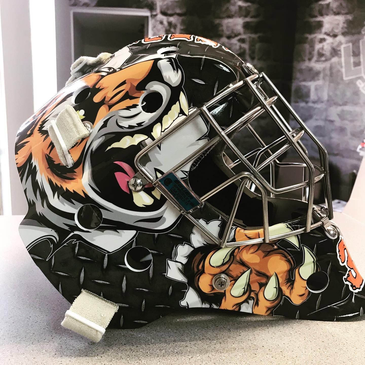 Tiger artwork on a custom goalie mask